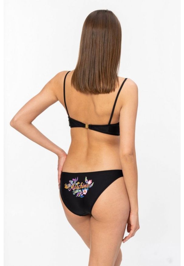 MOSCHINO Czarna góra od bikini z kwiecistym logo. Kolor: czarny. Wzór: kwiaty, nadruk