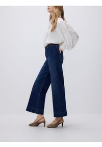 Reserved - Jeansy z paskiem - niebieski. Kolor: niebieski