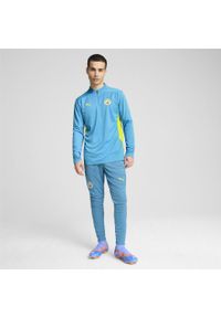 Puma - Męska bluza treningowa Manchester City z zamkiem 1/4 PUMA Magic Blue Yellow Glow. Kolor: żółty, niebieski, wielokolorowy