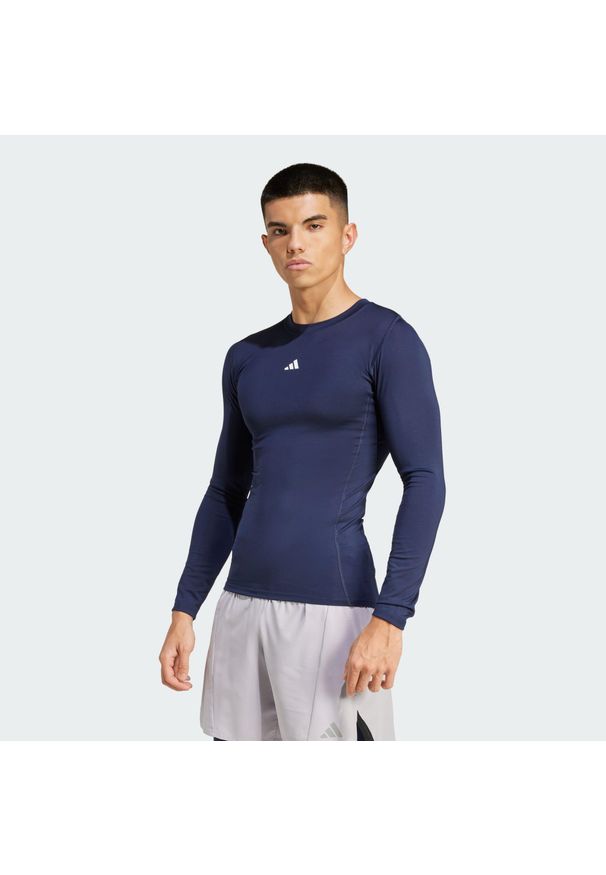 Adidas - Koszulka TECHFIT Compression Training Long Sleeve. Kolor: wielokolorowy, niebieski, szary. Materiał: materiał. Długość rękawa: długi rękaw. Technologia: Techfit (Adidas). Sport: fitness