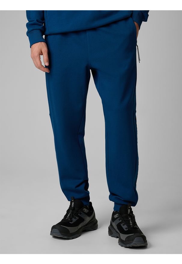 4f - 4F Spodnie dresowe joggery męskie - turkusowe L. Kolor: turkusowy. Materiał: dresówka. Sport: fitness