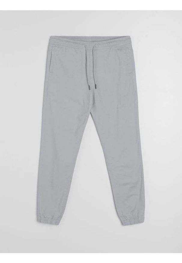 Sinsay - Bawełniane spodnie jogger - szary. Kolor: szary. Materiał: bawełna
