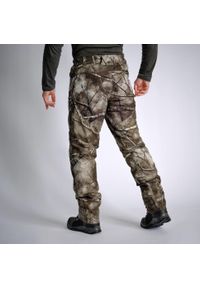 SOLOGNAC - Spodnie myśliwskie Solognac Warm 900 camo treemetic wodoodporne. Kolor: zielony, wielokolorowy, brązowy. Materiał: polar, materiał, skóra, tkanina