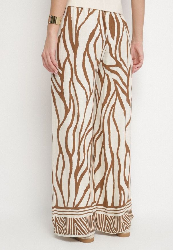 Born2be - Brązowe Wiskozowe Spodnie z Lnem o Szerokim Kroju z Wysokim Stanem w Zebrę Fenelina. Okazja: na co dzień. Stan: podwyższony. Kolor: brązowy. Materiał: wiskoza, len. Wzór: motyw zwierzęcy. Styl: elegancki, casual