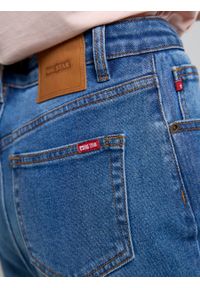 Big-Star - Spodnie jeans dziewczęce Sia 335. Stan: podwyższony. Kolor: niebieski. Materiał: jeans. Wzór: gładki. Styl: klasyczny