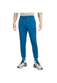 Nike - Męskie Spodnie Do Biegania Libero DriFIT. Kolor: niebieski