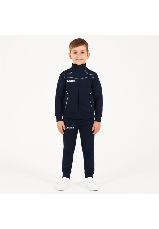 LEGEA - Komplet dresowy dla chłopca TEXAS JUNIOR JR. Okazja: na uczelnię. Kolor: niebieski, wielokolorowy, biały. Materiał: dresówka. Styl: sportowy