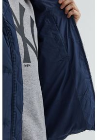 Tommy Jeans kurtka puchowa męska kolor granatowy zimowa. Okazja: na co dzień. Kolor: niebieski. Materiał: puch. Sezon: zima. Styl: casual #4
