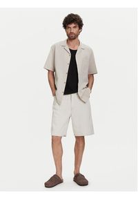 GAP - Gap Szorty jeansowe 781609 Beżowy Loose Fit. Kolor: beżowy. Materiał: bawełna