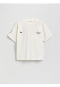 Reserved - T-shirt oversize z nadrukiem - złamana biel. Materiał: bawełna, dzianina. Wzór: nadruk