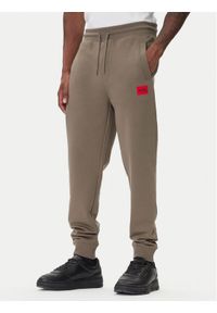 Hugo - HUGO Spodnie dresowe Doak212 50447963 Beżowy Regular Fit. Kolor: beżowy. Materiał: bawełna #1