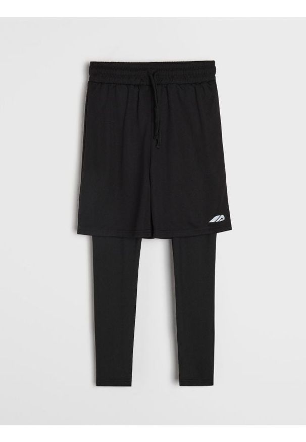 Sinsay - Legginsy sportowe z szortami Active - czarny. Kolor: czarny. Styl: sportowy