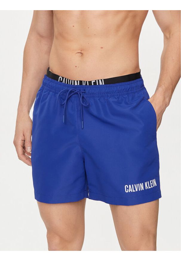 Calvin Klein Swimwear Szorty kąpielowe KM0KM00992 Granatowy Regular Fit. Kolor: niebieski. Materiał: syntetyk