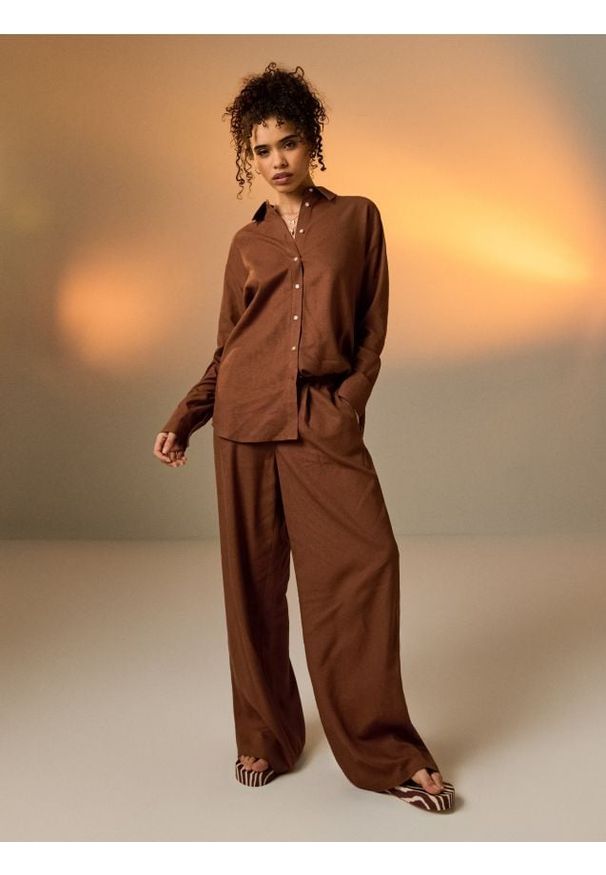 Sinsay - Spodnie wide leg z domieszką lnu - beżowy. Kolor: beżowy