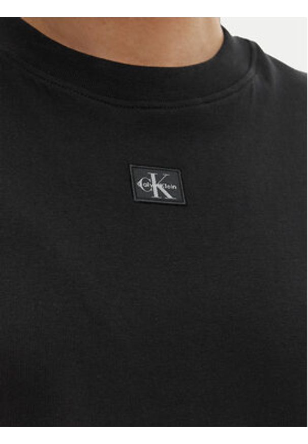 Calvin Klein Jeans Sukienka codzienna LV047F228G Czarny Oversize. Okazja: na co dzień. Kolor: czarny. Materiał: bawełna. Typ sukienki: oversize, proste. Styl: casual