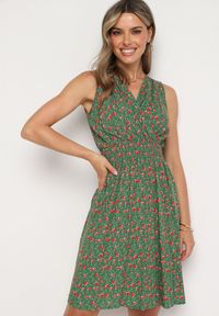 Born2be - Zielona Wiskozowa Sukienka w Kwiaty z Gumką w Talii i Kopertowym Dekoltem Halevia. Okazja: na imprezę. Kolor: zielony. Materiał: wiskoza. Wzór: kwiaty. Sezon: lato. Typ sukienki: kopertowe. Styl: elegancki #7