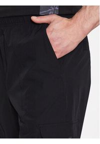 Calvin Klein Jeans Spodnie dresowe J30J323498 Czarny Regular Fit. Kolor: czarny. Materiał: syntetyk