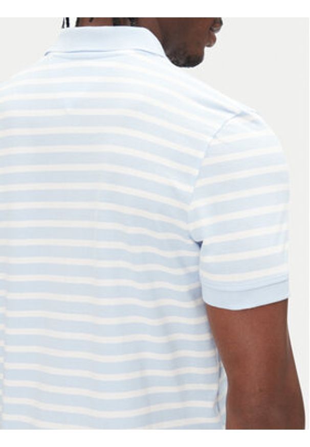 Tommy Jeans Polo DM0DM20676 Błękitny Slim Fit. Typ kołnierza: polo. Kolor: niebieski. Materiał: bawełna
