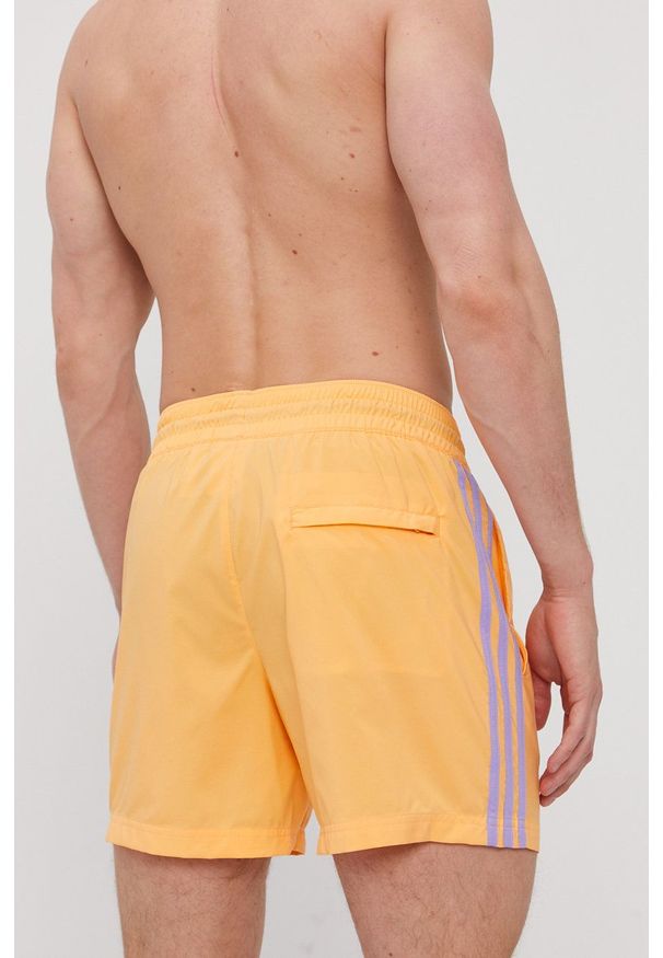 adidas Originals Szorty kąpielowe kolor pomarańczowy. Kolor: pomarańczowy. Materiał: poliester. Wzór: aplikacja