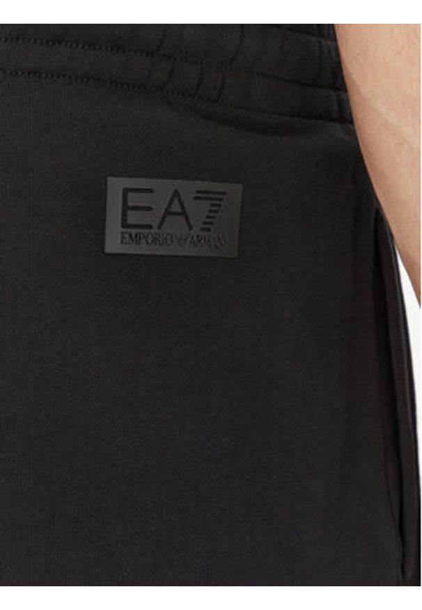 EA7 Emporio Armani Spodnie dresowe 7M000154 AF10432 UC001 Czarny Regular Fit. Kolor: czarny. Materiał: bawełna