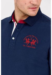 La Martina - LA MARTINA Granatowy męski longsleeve polo HEAVY JERSEY. Okazja: na co dzień. Typ kołnierza: polo. Kolor: niebieski. Materiał: jersey. Długość rękawa: długi rękaw. Styl: casual, klasyczny