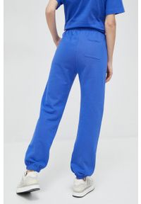 Champion spodnie dresowe kolor niebieski gładkie. Kolor: niebieski. Materiał: dresówka. Wzór: gładki #2
