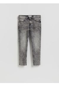 Reserved - Jeansy slim z efektem sprania - jasnoszary. Kolor: szary #1