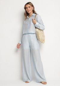 Born2be - Jasnoniebieskie Spodnie Palazzo o Szerokim Kroju z Gumką w Pasie i Wysokim Stanem Jenanetia. Okazja: na co dzień. Stan: podwyższony. Kolor: niebieski. Styl: klasyczny, casual #6