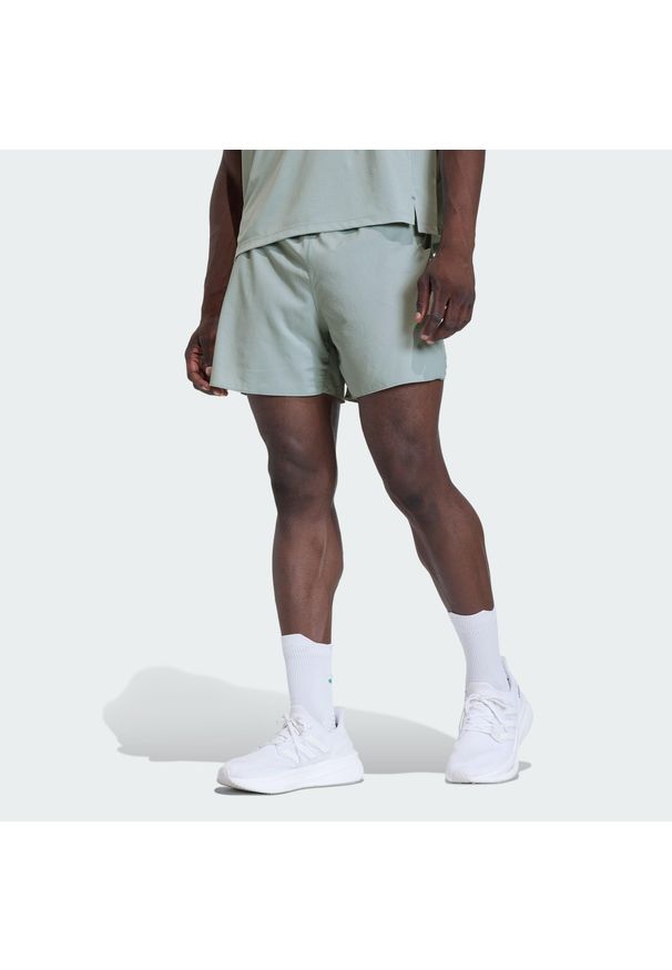 Adidas - Szorty adi365 FORMOTION. Kolor: zielony. Sport: bieganie, fitness