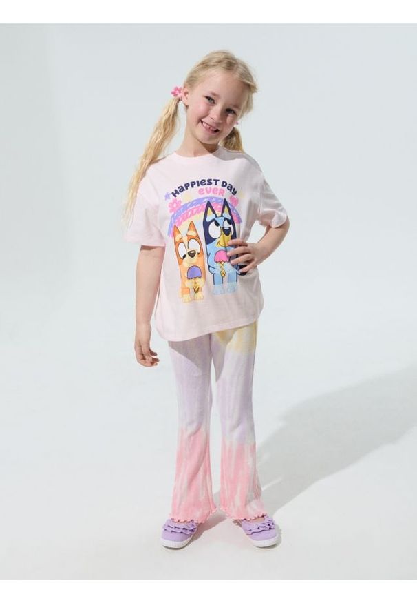 Sinsay - Bawełniane legginsy flare ze wzorem tie dye - wielobarwny. Materiał: bawełna