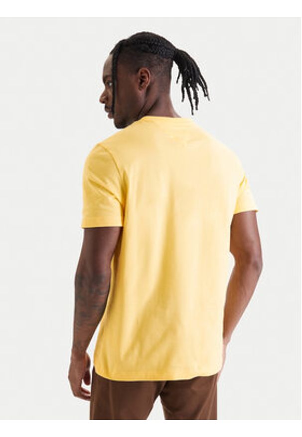 TOMMY HILFIGER - Tommy Hilfiger T-Shirt Ess Seasonal MW0MW39995 Żółty Regular Fit. Kolor: żółty. Materiał: bawełna