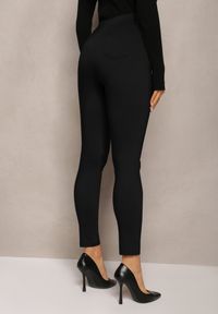 Renee - Czarne Spodnie Skinny z Ozdobnymi Napami Eclaria. Stan: podwyższony. Kolor: czarny. Wzór: aplikacja #4