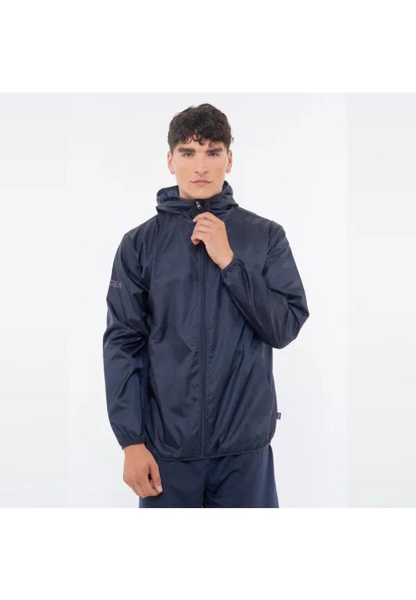 LEGEA - Kurtka Legea Atacama Dorosłych. Kolor: niebieski. Materiał: poliester. Sezon: zima. Sport: bieganie, fitness