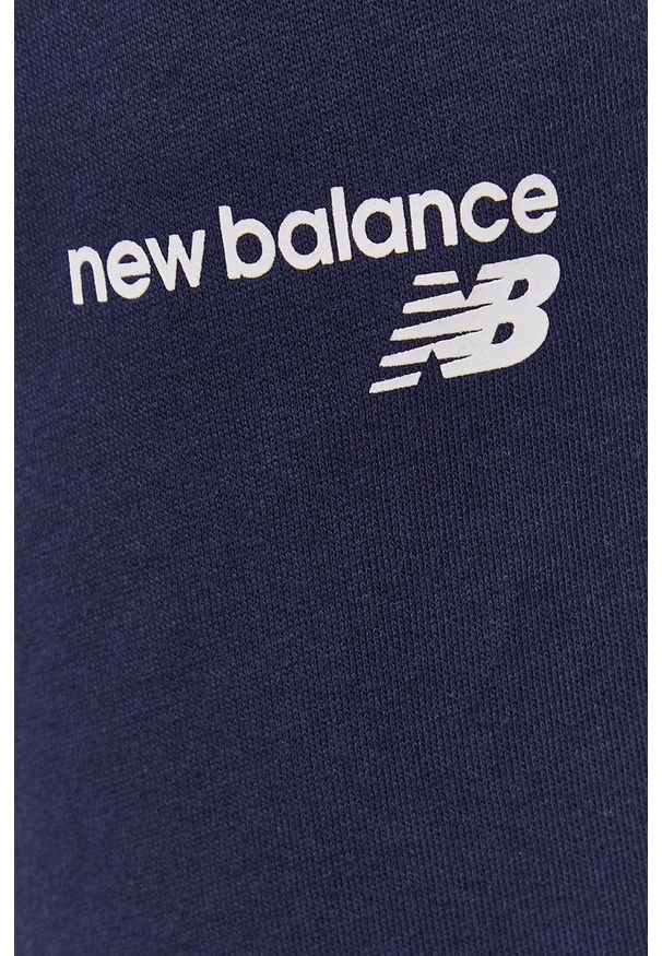New Balance Spodnie męskie kolor granatowy gładkie. Kolor: niebieski. Wzór: gładki