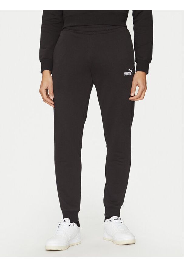 Puma Spodnie dresowe Ess No. 1 Logo 682608 Czarny Regular Fit. Kolor: czarny. Materiał: bawełna, syntetyk