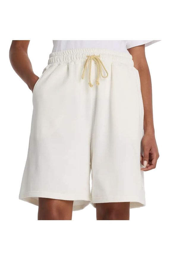 Spodenki damskie New Balance WB61H5V6SST - beżowe. Kolor: beżowy. Materiał: materiał, bawełna, dresówka, poliester. Długość: krótkie