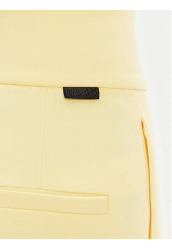 Hugo - HUGO Spodnie materiałowe Himia 50513960 Żółty Regular Fit. Kolor: żółty. Materiał: syntetyk