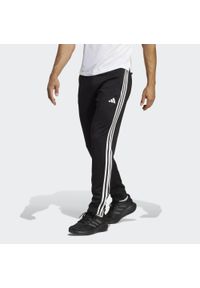 Adidas - Train Essentials 3-Stripes Training Pants. Kolor: biały, czarny, wielokolorowy. Materiał: dresówka, materiał #1