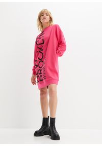 bonprix - Sukienka dresowa oversize z miękkiej mieszanki bawełny. Kolor: różowy. Materiał: bawełna, dresówka. Wzór: nadruk. Typ sukienki: oversize #1