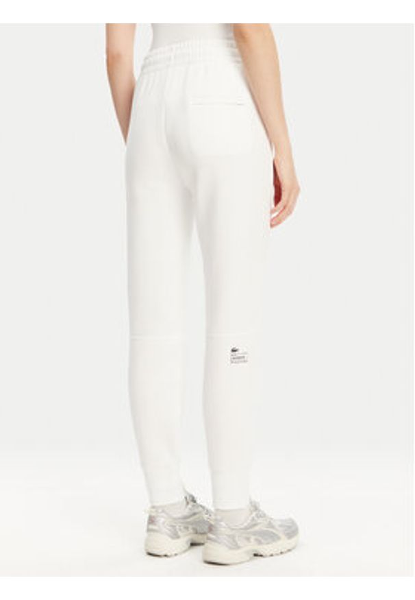 Lacoste Spodnie dresowe XF0343 Biały Regular Fit. Kolor: biały. Materiał: bawełna