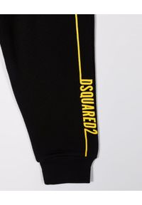 DSQUARED2 KIDS - Spodnie dresowe z żółtym logo 4-16 lat. Kolor: czarny. Materiał: dresówka. Wzór: nadruk. Sezon: lato #2