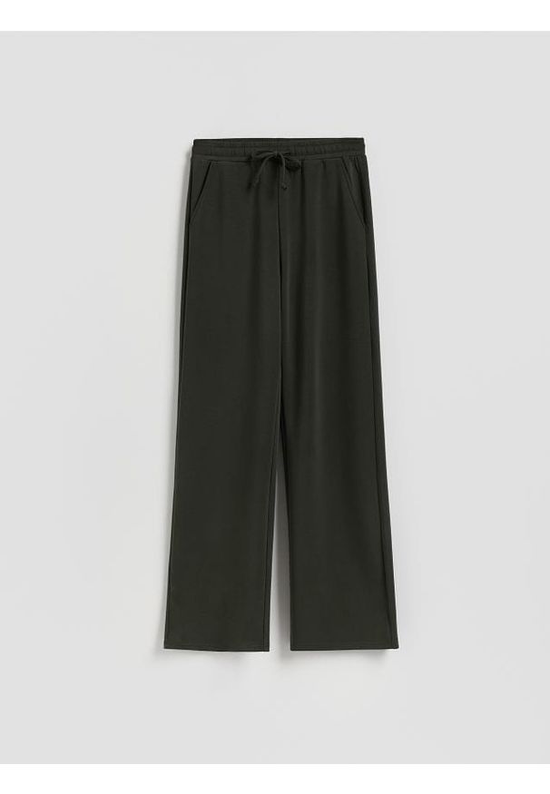 Reserved - Spodnie long leg - ciemnozielony. Kolor: zielony. Materiał: dzianina