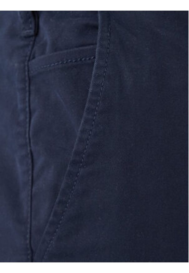 Tommy Jeans Spodnie materiałowe DM0DM22404 Granatowy Regular Fit. Kolor: niebieski. Materiał: bawełna