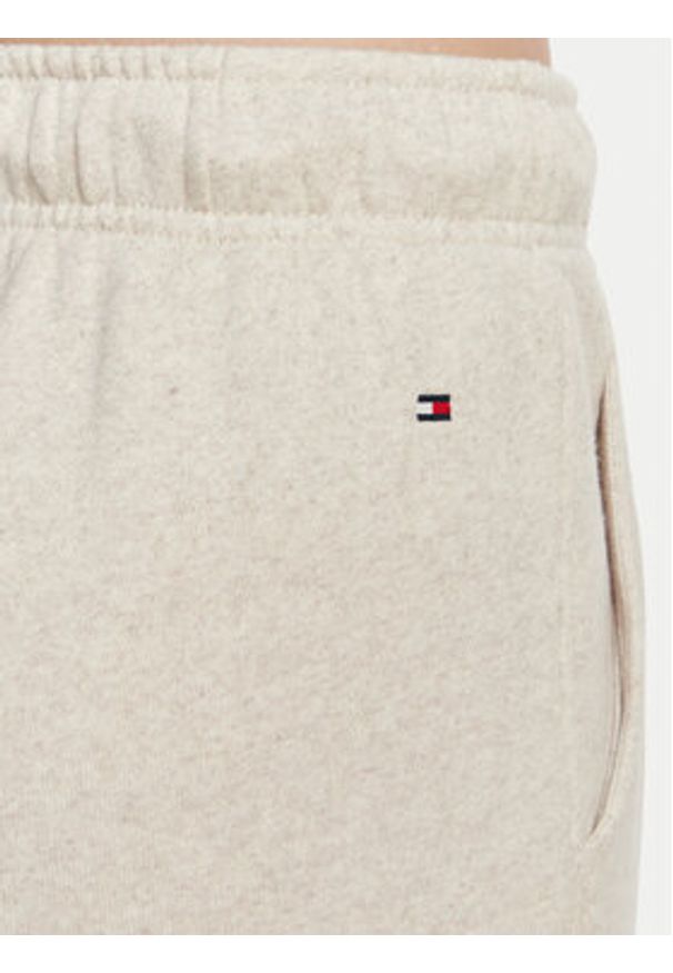 TOMMY HILFIGER - Tommy Hilfiger Spodnie dresowe Logo Exaggerated Seam WW0WW50783 Kremowy Relaxed Fit. Kolor: kremowy. Materiał: bawełna