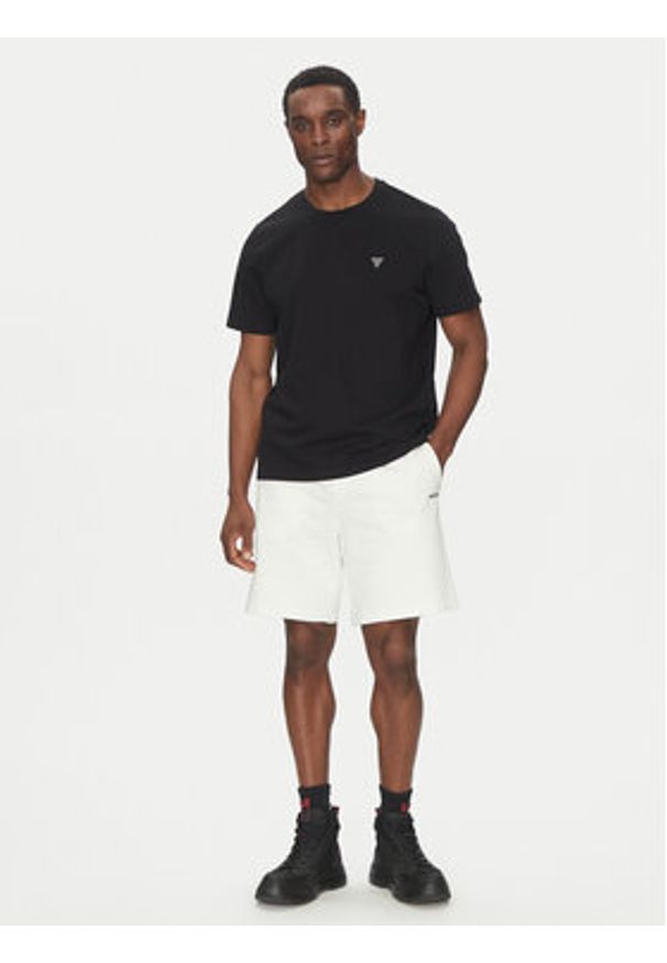 Hugo - HUGO Szorty sportowe Dayono 50530696 Beżowy Relaxed Fit. Kolor: beżowy. Materiał: bawełna. Styl: sportowy