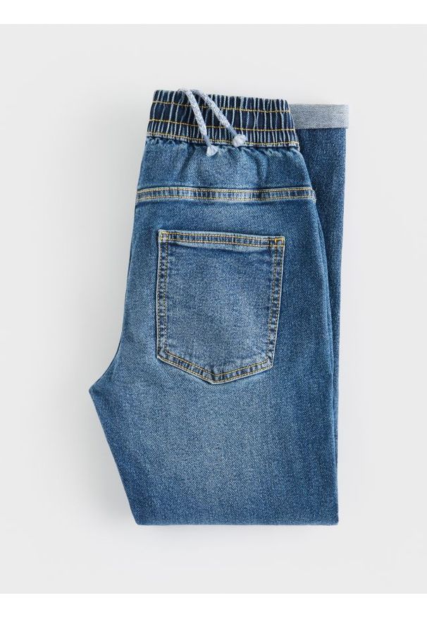 Reserved - Jeansy carrot fit - niebieski. Kolor: niebieski