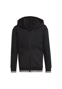 Kurtka Dziecko Adidas Track En Molleton Entièrement Zippée All Szn czarny. Kolor: czarny, szary, wielokolorowy. Sport: joga i pilates