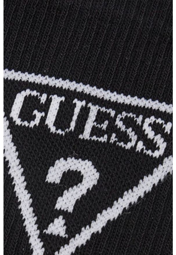 Guess - GUESS Czarne męskie sportowe skarpetki. Kolor: czarny. Materiał: dzianina