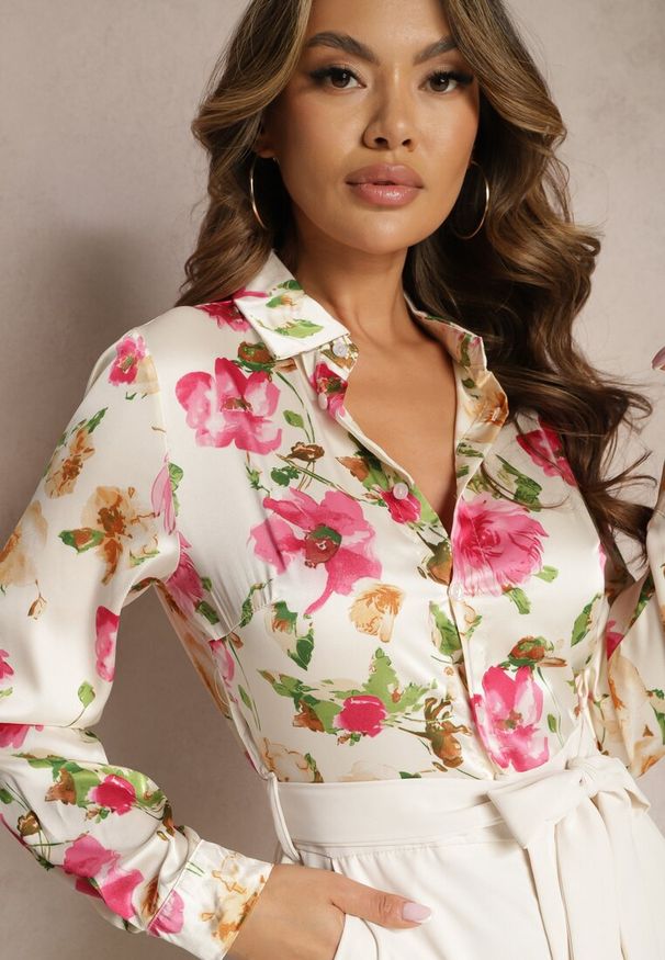 Renee - Jasnobeżowy Elegancki Kombinezon z Koszulową Górą w Kwiaty Wiązany w Talii Klerovia. Kolor: beżowy. Długość: długie. Wzór: kwiaty. Styl: elegancki