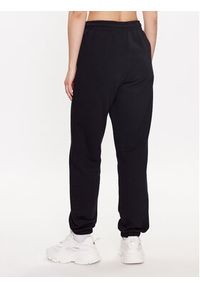 ROTATE Spodnie dresowe Mimi 700291100 Czarny Relaxed Fit. Kolor: czarny. Materiał: bawełna #5